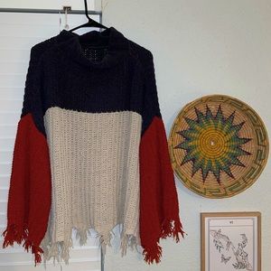 Boutique multicolor fringe knit sweater. Red/grey/cream